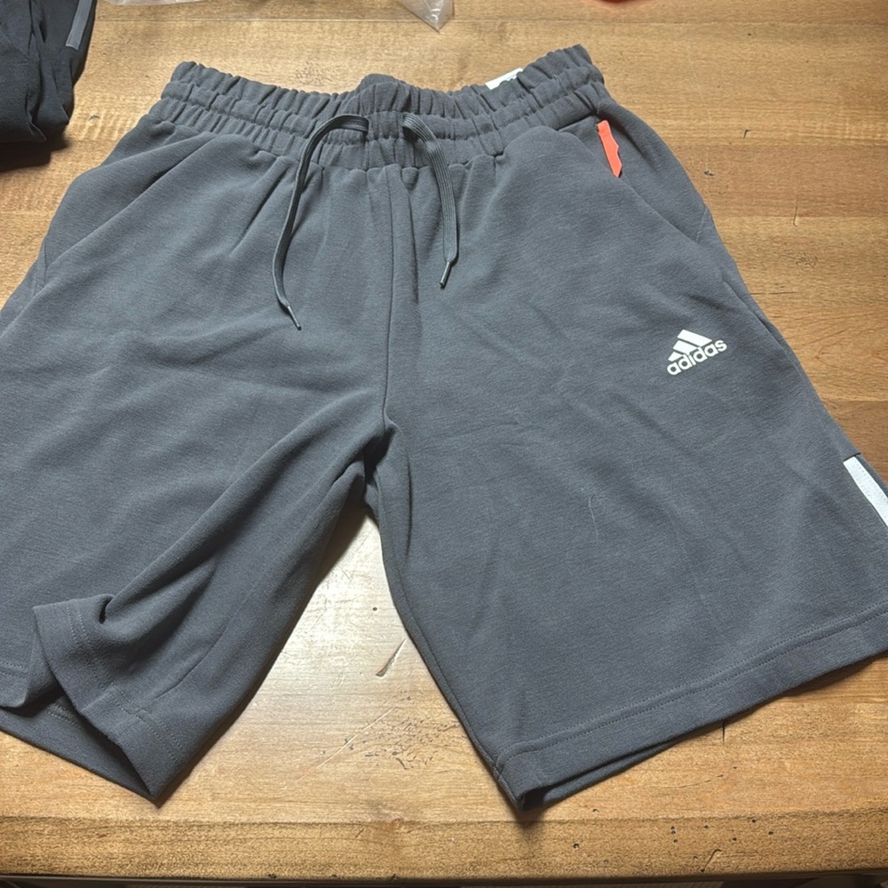 Men’s Adidas shorts. New and all that! Nice little pop of orange, too!